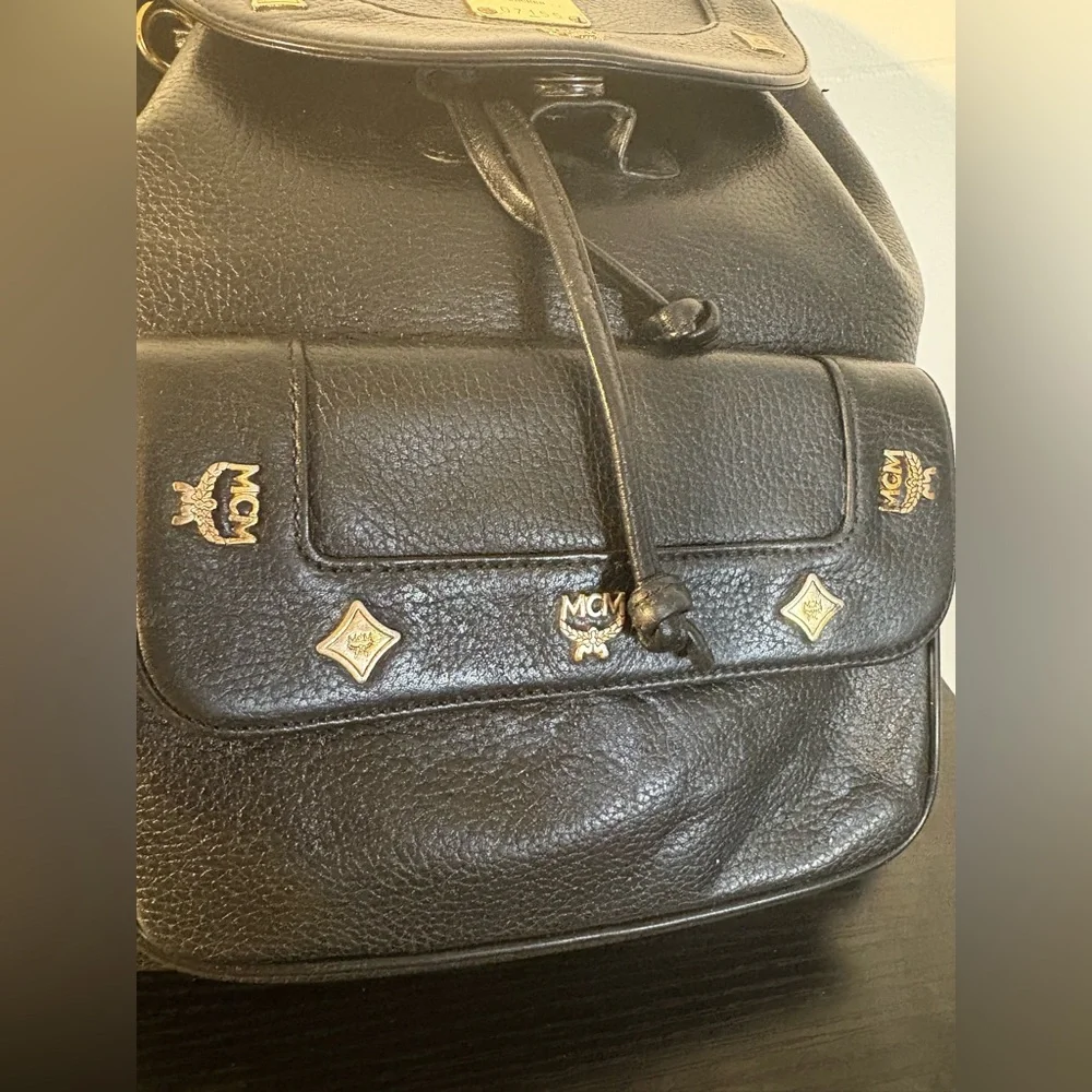 MCM‎ Black Leather Backpack with Gold Accents and draw strings 12